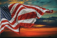 american-flag-flying-over-beautiful-sunset-sunrise-with-clouds-valentyn-semenov.jpg